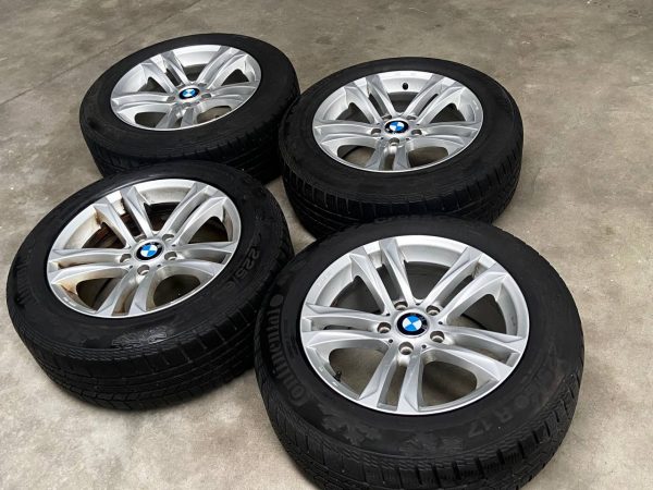 Een set prachtige BMW velgen met winterbanden. - Afbeelding 5