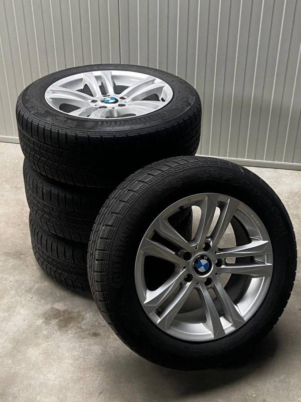 Een set prachtige BMW velgen met winterbanden. - Afbeelding 2